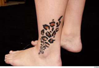 Charlie Red foot nude tattoo 0001.jpg